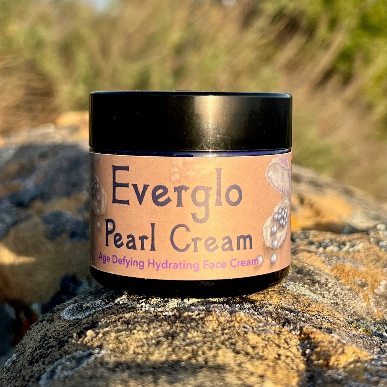 photograph of Everglo Pearl Cream Jar on rock