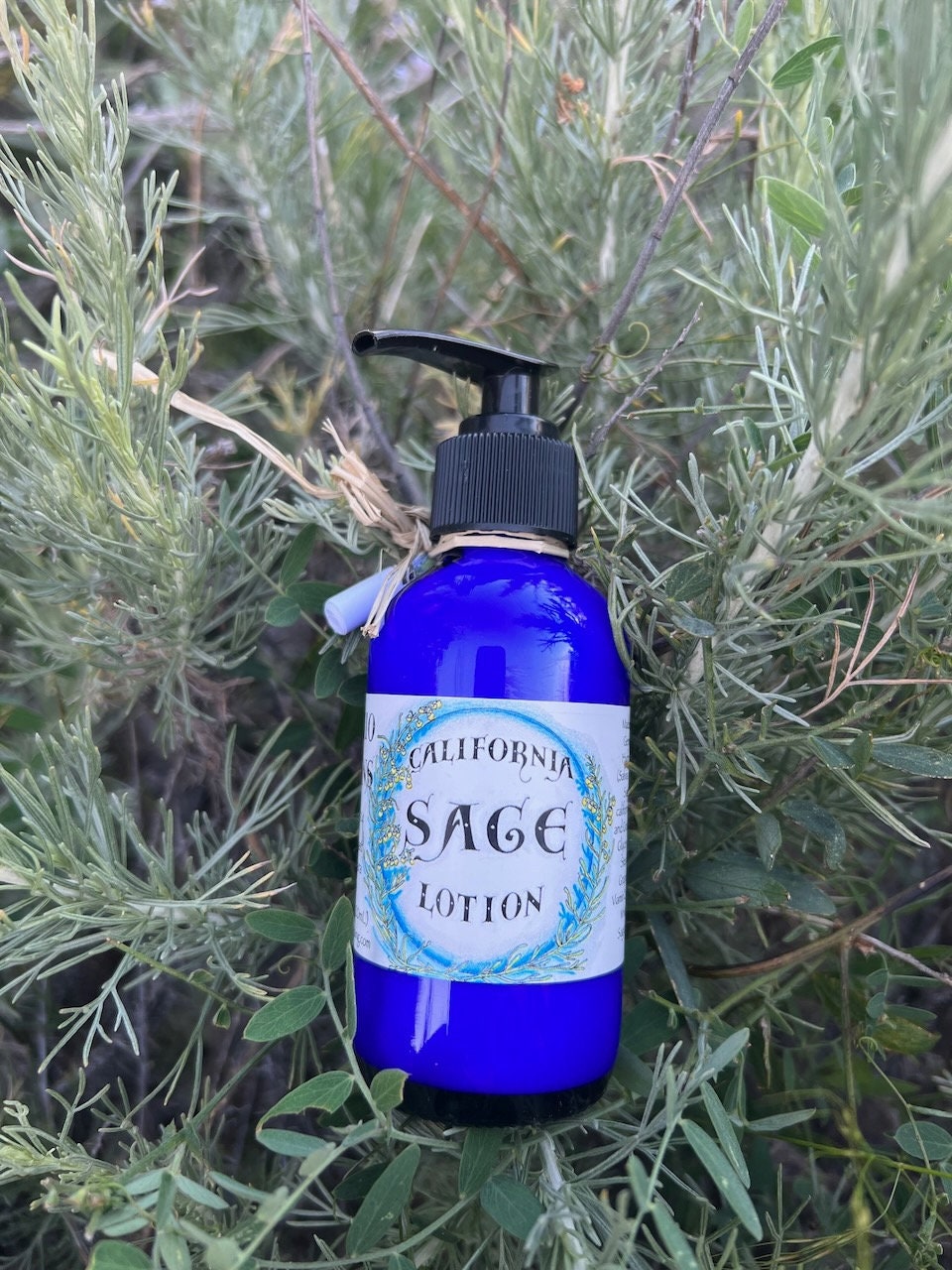 Photograph of 4 oz cobalt blue california sage lotion